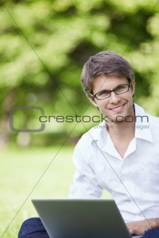 Young man with laptop 