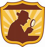 detective inspector with magnifying glass 