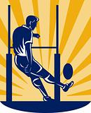 rugby player kicking at goal post
