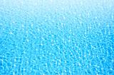 blue swimming pool with ripple water and reflection