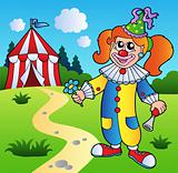 Cartoon clown girl with circus tent