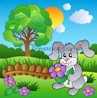 Meadow with bunny holding flower