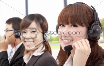 Smiling business customer service team on the phone
