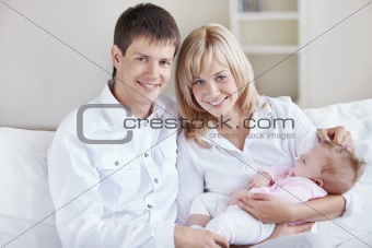 Parents with a tiny baby