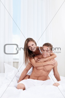 The happy couple in the bedroom