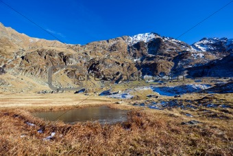 Fagaras mountains in the fall with blue sky