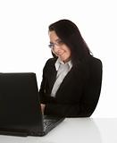 Beautiful business woman working on laptop