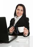 Beautiful business woman drinking coffee