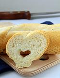 fresh piece of bread in a heart-shaped, natural form