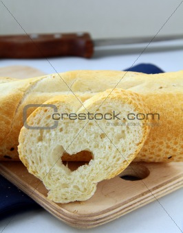 fresh piece of bread in a heart-shaped, natural form