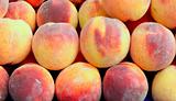 Fresh peaches on market stall