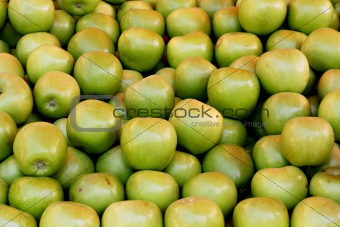Green apples on a market stall