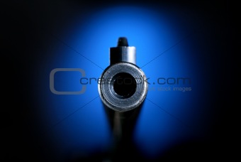 Gun barrel on blue
