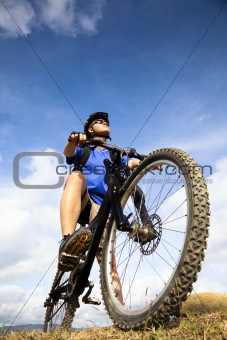 Mountain Biker and blue sky background