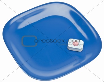 Dishwashing Tablet and Clean Plate