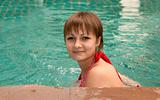 Beautiful girl swimsuit in pool