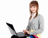 Young beautiful girl with computer