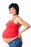 Smiling pregnant woman over white background