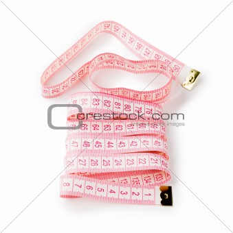 Measuring tape of the tailor - house isolated on white