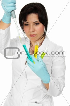 Scientist, pipette and test tubes