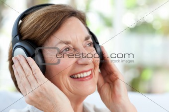 Senior listening to music