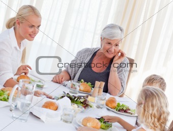 Family talking together at table
