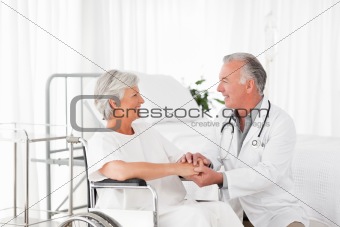 Doctor speaking with his patient