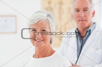 Senior patient and her mature doctor