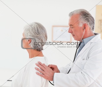 Doctor examining his patient