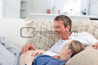 Couple lying down on the couch