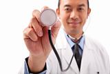 Asian Doctor holding stethoscope