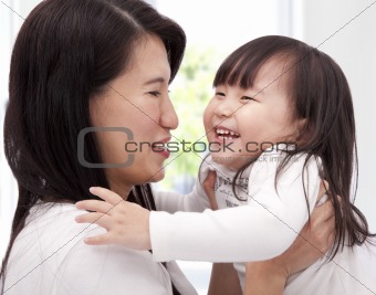 Close-up of asian little girl and  her mother