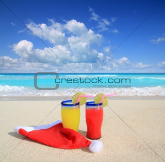 Beach cocktails with Santa christmas red winter hat