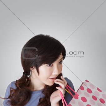 Surprised shopping woman