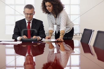 businessman and assistant with tablet pc