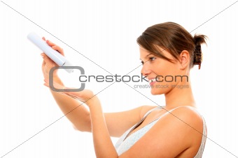 Young woman using body lotion