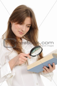 woman looking papers with magnifying glass 