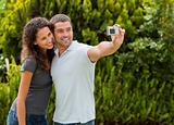 Couple taking a photo of themselves