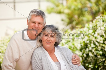 Retired couple looking at the camera