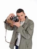 Young professional photographer with old retro film camera
