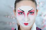 japan geisha woman with creative make-up.close-up