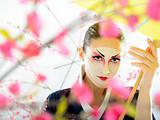 japan geisha woman with creative make-up in sakura garden.