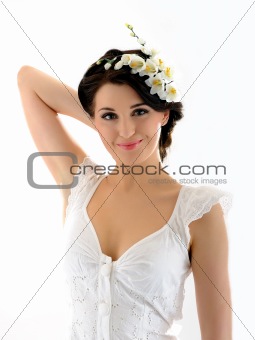 Beautiful fresh spring woman with flowers in her hair