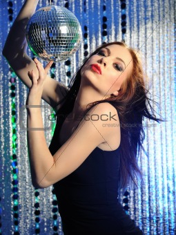 Attractive sexy woman dancing in the disco 