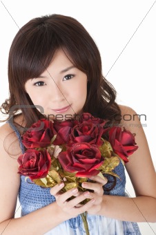 Happy young girl holding roses