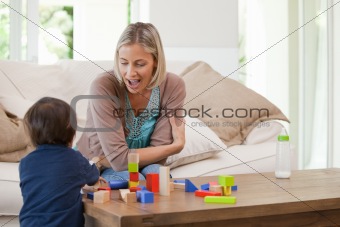 Mother playing with her child