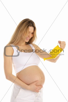 Pregnant woman watering her belly