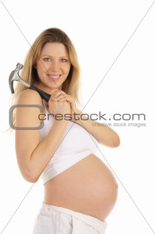 happy pregnant woman with a hammer