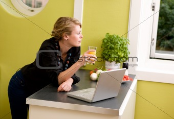 In Kitchen with Laptop