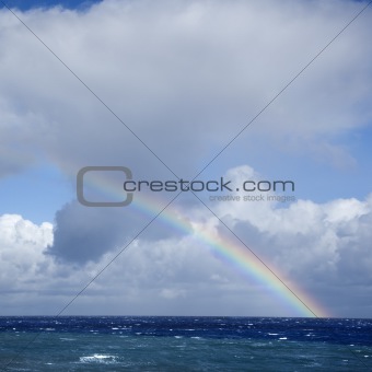 Ocean with rainbow.